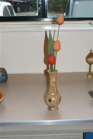 Tulips in a spalted holly vase won Bill Burden a highly commended certificate